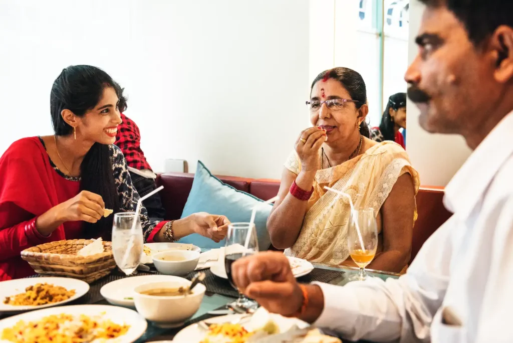 Family enjoying vegetarian Punjabi food at Tandoori Masala Brampton