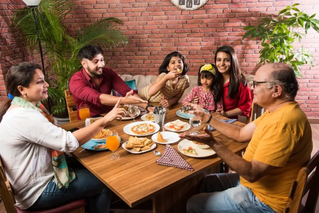 Family enjoying Haryali Soya Chaap Tikka at Tandoori Masala Brampton